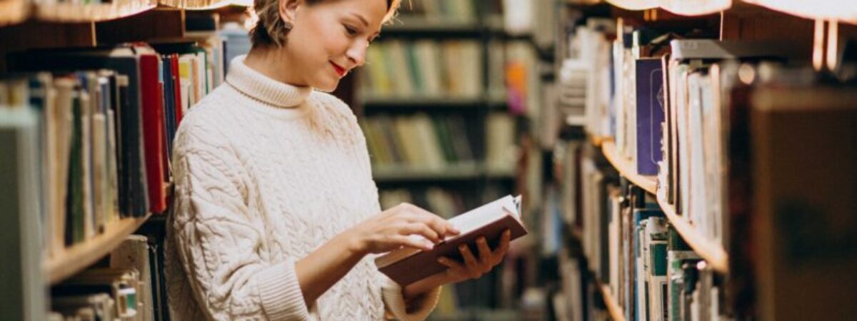 young-woman-studying-library